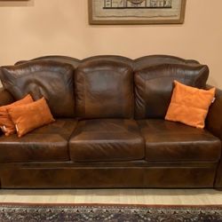 Leather couch + loveseat set 