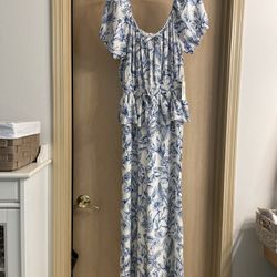 Brand new adorable women’s size medium white and blue floral romper/jumpsuit with tags.  