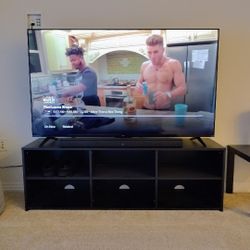 TCL "65" Inch TV With TV Stand 