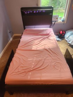 Twin bed frame with mattress