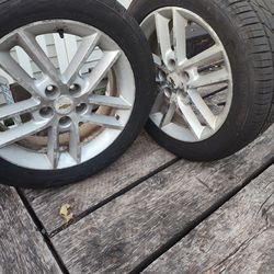 4 tires and rims. 235/50ZR18.