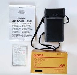 Sigma Vintage Zoom Auto Focus Lens 75-300 And Original lens Case  Box And Manual Multi Camera Compatible