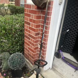 Ryobi 40V cordless string trimmer.