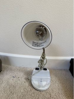 White desk lamp w/ media outlets