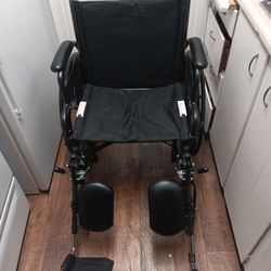Like New 20 Inch Wheelchair With Elevating Leg Rests