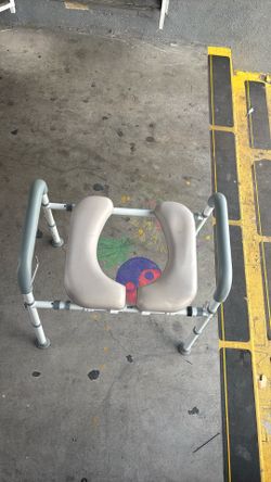 Raised toilet seat