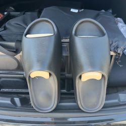 BRAND NEW!!! AUTHENTIC!!!! YEEZY SLIDES,  SIZE 12 in the BLACK ONYX
