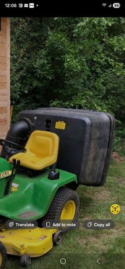 John Deere 300 series grass bagger