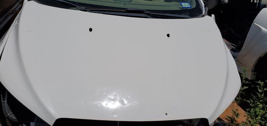 Hood for a 2013 Chevrolet sonic 2lt