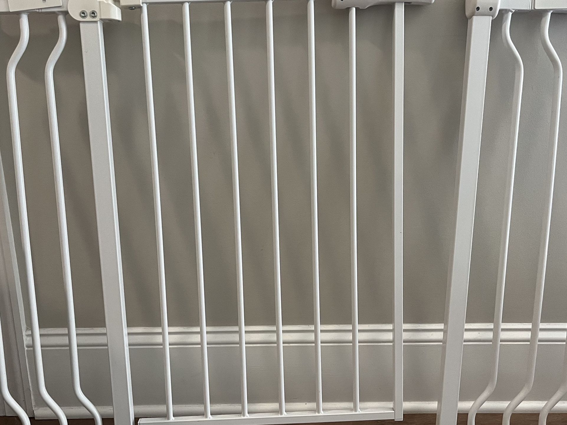 White tension baby gate with extenders 38-42”  Condition used - $20