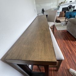 Table with barstool and chair