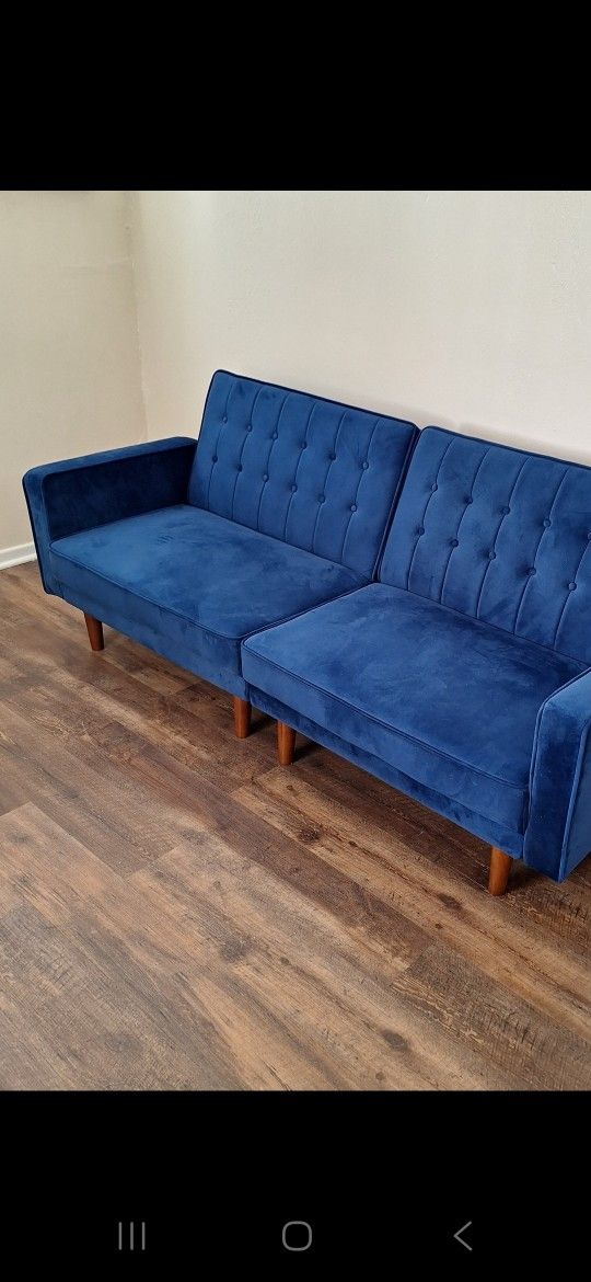 Blue Futon. In Great Shspe. Makes Into A Full Size Bed