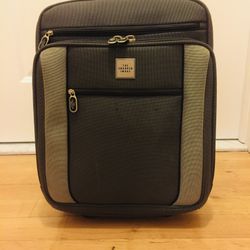 Travel Luggage. Very durable. You can put lots of stuff in it and it still fits in a carry-on luggage compartment in an airplane. Barely used. Like ne