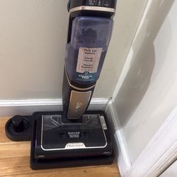 Shark Steam Pickup 3-in-1 Steam Mop, model SD201.