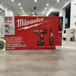 Milwaukee M18 1.5” High Torque Impact Wrench And M12 3/8” Ratchet Battery Charger 