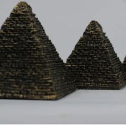 Three pyramids made of stone .Large ,Medium, and Small.