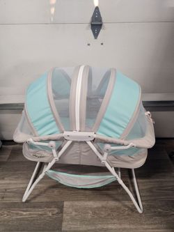 *** BRAND NEW BASSINET ***