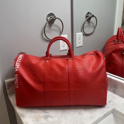 Louis Vuitton Red Duffle Bag