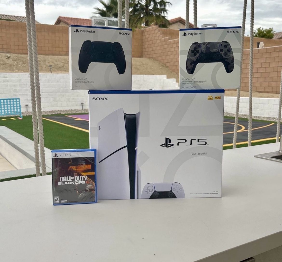 PS5 slim with two extra controllers and call of duty black ops 6 game with 2yr Warranty