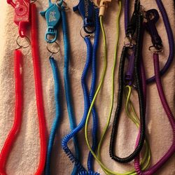 Lot of 7 Bungee Cord Clip Keychain Card Holders from South Florida Gaming Establishments in different colors. ** Cash 💸 only, please. Local pick-up 