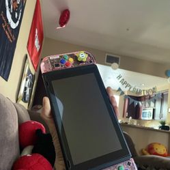 Pink Nintendo Switch With Obleets And Case Screen Protecter