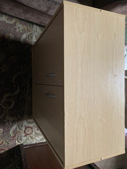 3 shelf light brown cabinet