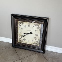 An Exquisite Framed Wall GLENMONT Clock in chocolate brown Finish
