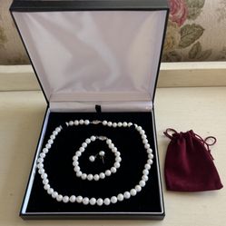 Pearl necklace set with bracelet and earrings. Cash only, please