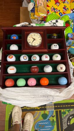 Golf ball shelf, and clock holder