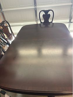 Dining table with matching chairs for six