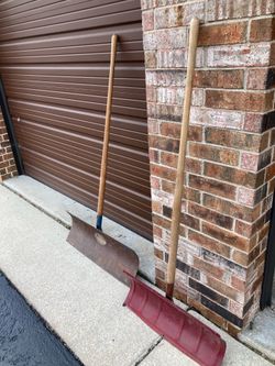 2 big steel snow shovels