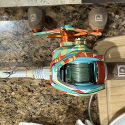 Fishing pod with bait casting reel