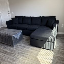 Brand New Black Sectionals With Free Ottoman 