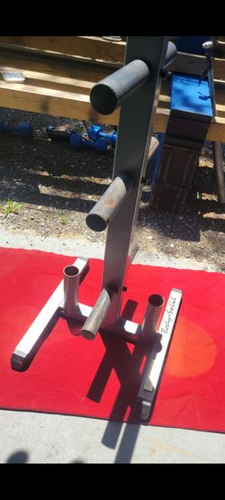 BODY SOLID 2" HOLE BAR AND PLATE RACK.  2 BAR HOLDERS AND 6 PLATE HORNS 
11525 S HALSTED/7111 S WESTERN 
60$  CASH ONLY AS IS