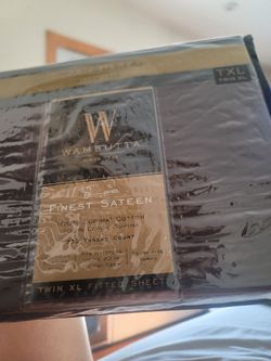 Wamsutta Finest Sateen Twin XL Fitted Sheet in chocolate brown, 100% Supima cotton, 725 thread count.