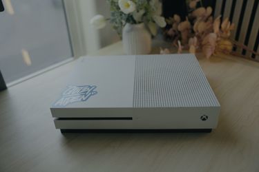 Xbox one s and Xbox controller with HDMI chord and power chord