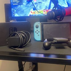 nintendo switch (comes with games and accessories)
