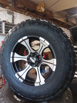 ((8X170)) 20" RIMS ON MICKEY THOMPSON TIRES