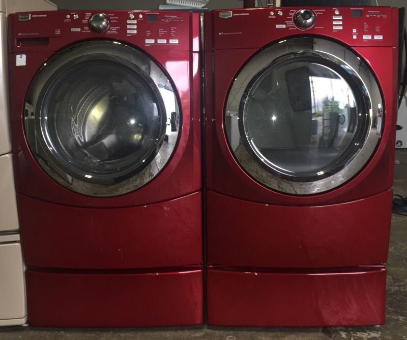 Red Maytag 3000 Series Front Load Washer and Gas Dryer Set with Pedestals