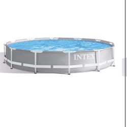 New in box, filter pump included. Intex Round Prism Frame Pool Set | 12ft x 30" | 26711EH model