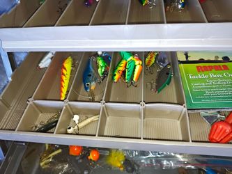 Tackle box with random fishing stuff.