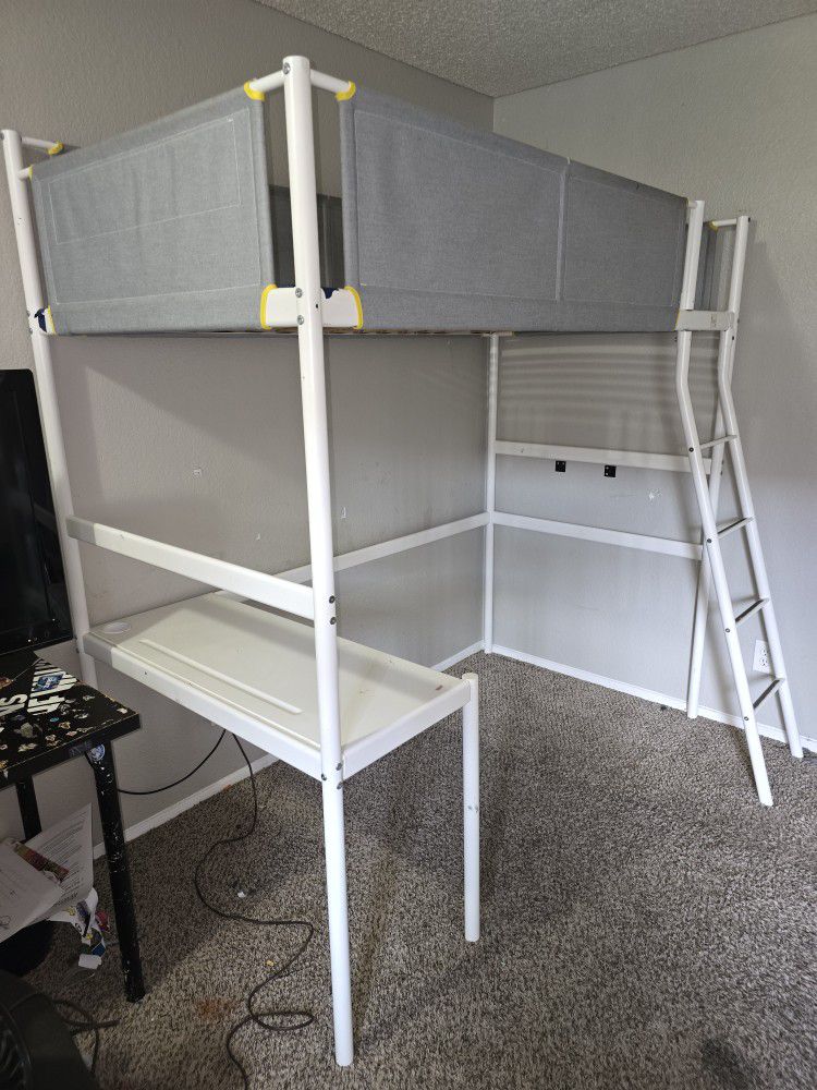 Loft bed frame with desk top