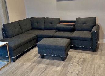 Charcoal linen sectional couch and ottoman