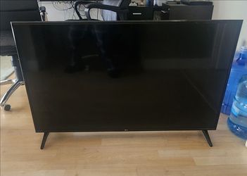 LG 50” 4K UHD Smart TV with HDR – Great Condition + Remote & Stand