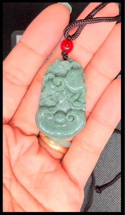 Chinese zodiac ox jade pendant necklace