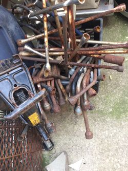 Tire irons, four ways and bumper jack