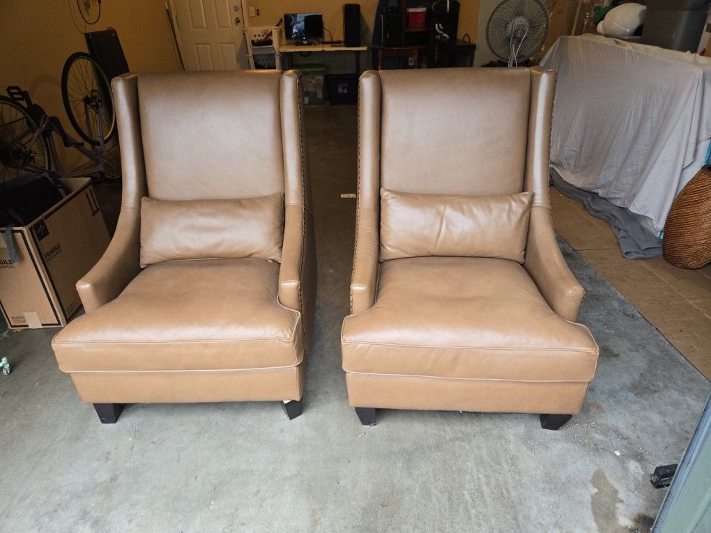 Classic traditional wingback style. High back for excellent support. Decorative exposed dark wood legs.