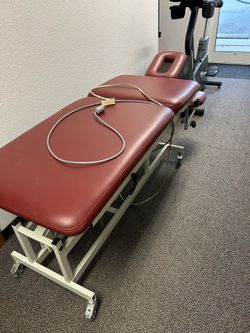Adjustable treatment table