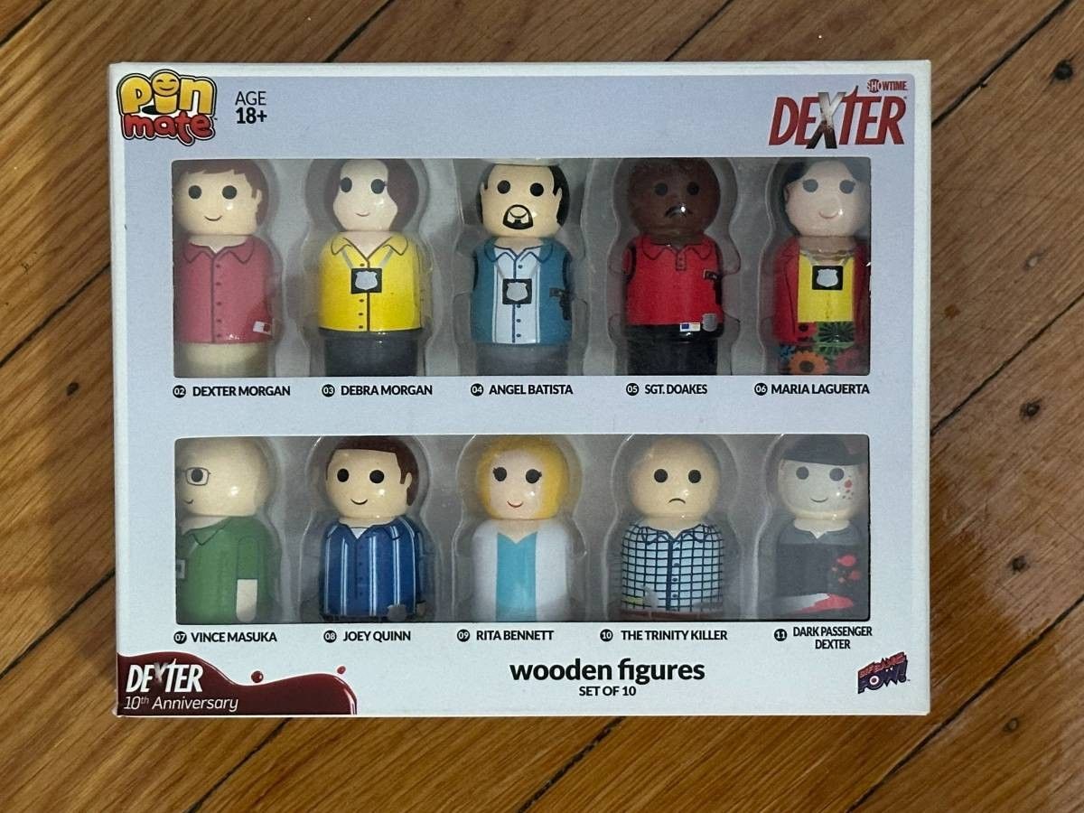 Rare collector's item Dexter 10th Anniversary Wooden Figures Set