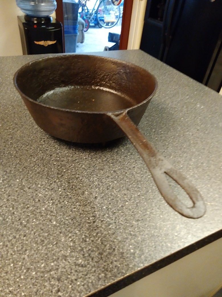 3 LEG 12". X. 3" DEEP CAST IRON. 70 BUCKS OR MAKE OFFER